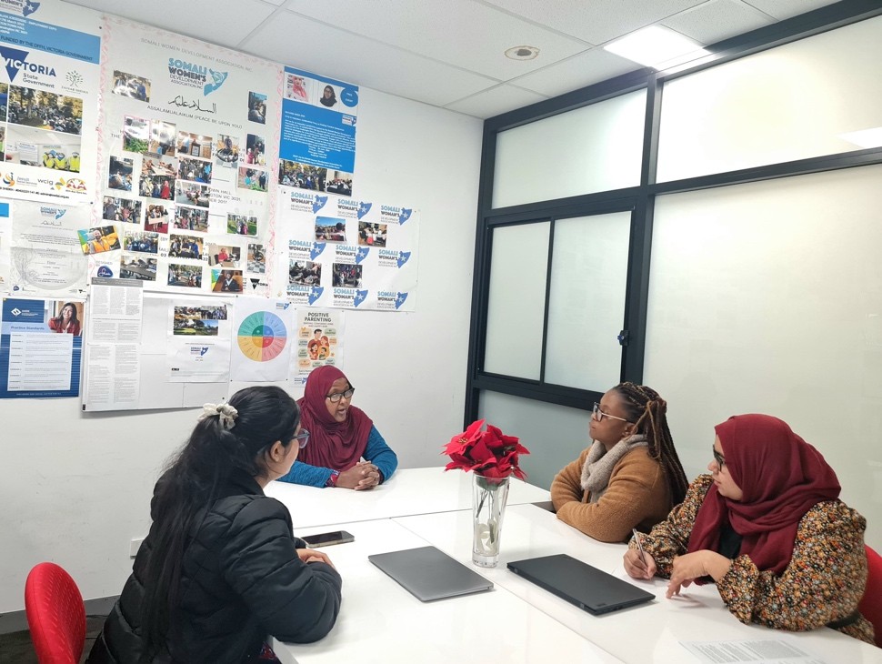 SWDA social work team meeting with a client in the Kensington office