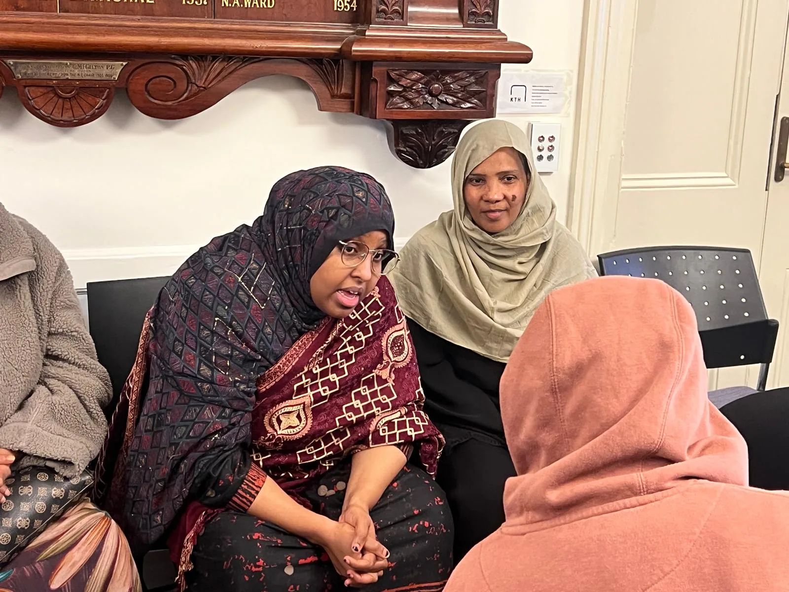 Community members in discussion during an Employment Brokers support session