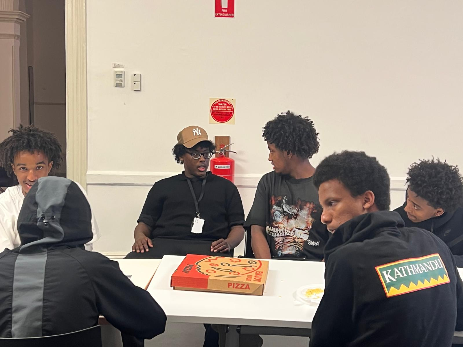 Young men in conversation during an Employment Brokers workshop session