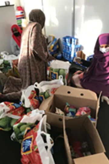 SWDA volunteers packing Emergency Food Relief hampers
