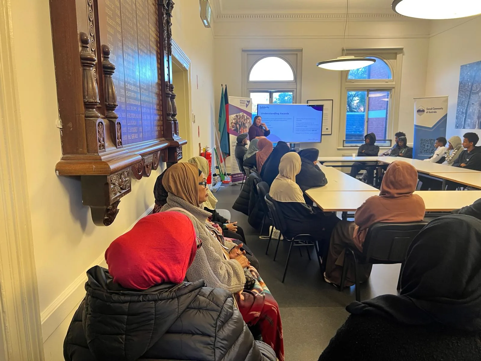 Participants attending an Employment Brokers workshop in a community training room
