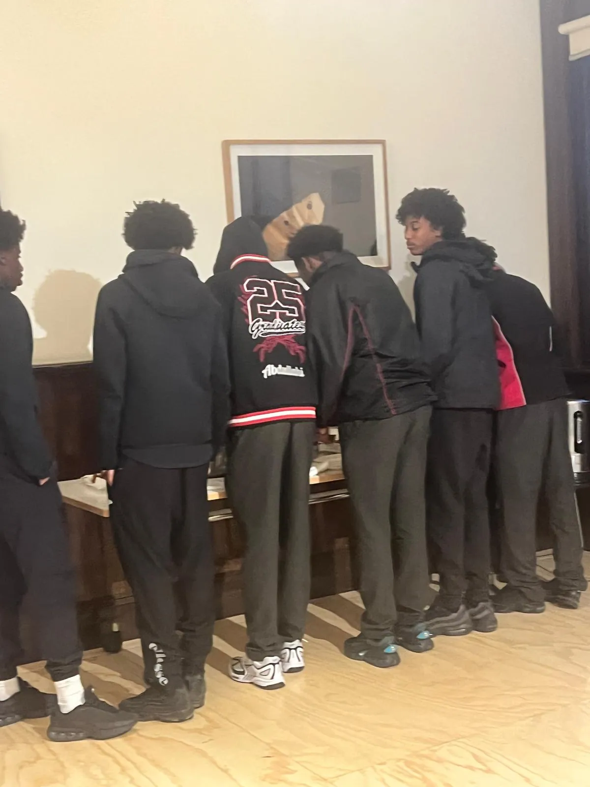 Homework Club participants signing in at the start of an evening session