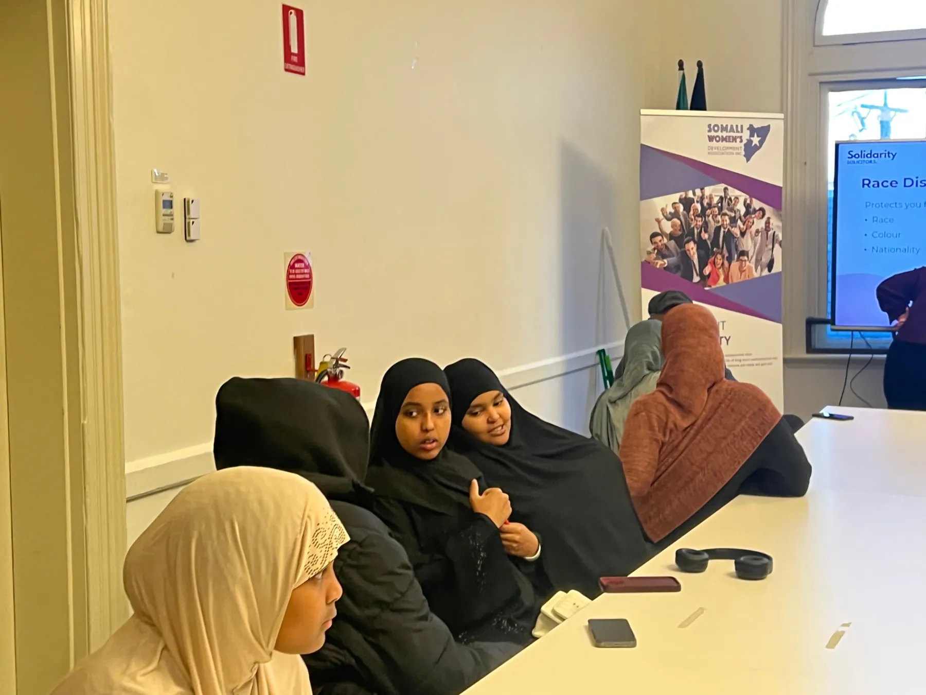 Participants attending a session on race discrimination and workplace rights