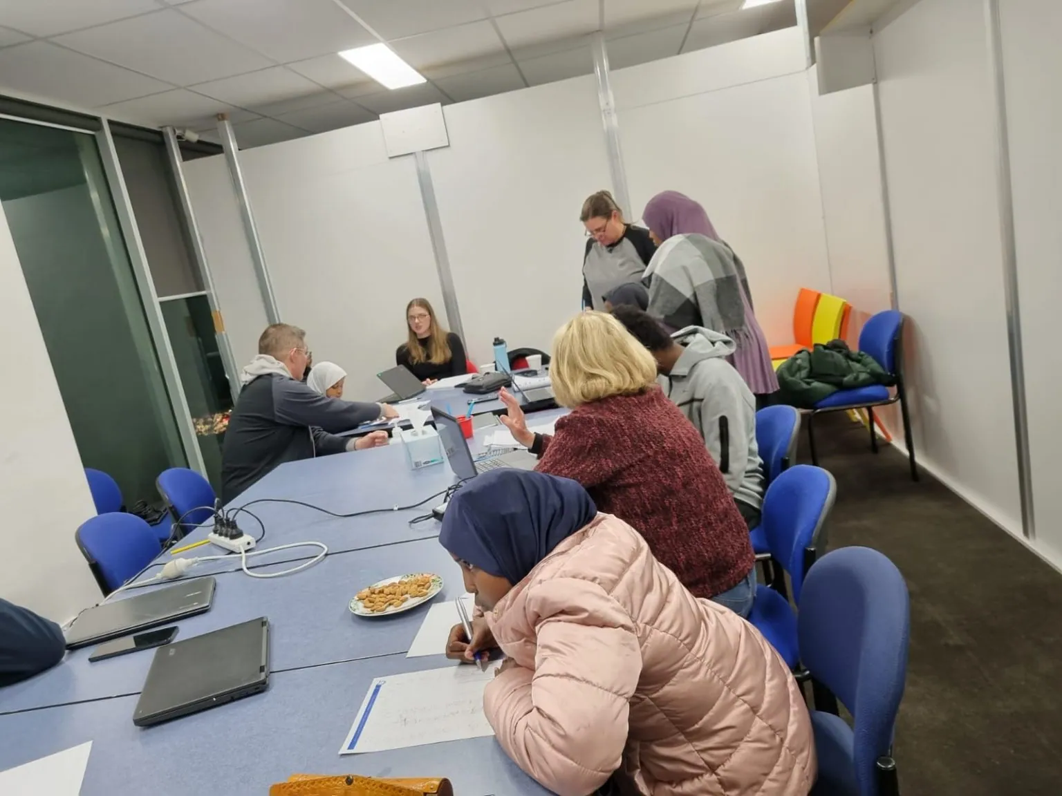 SWDA Homework Club — tutors supporting students with their homework