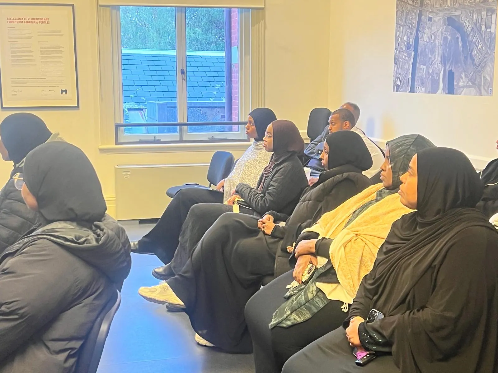Community members listening attentively during an SWDA Employment Brokers workshop